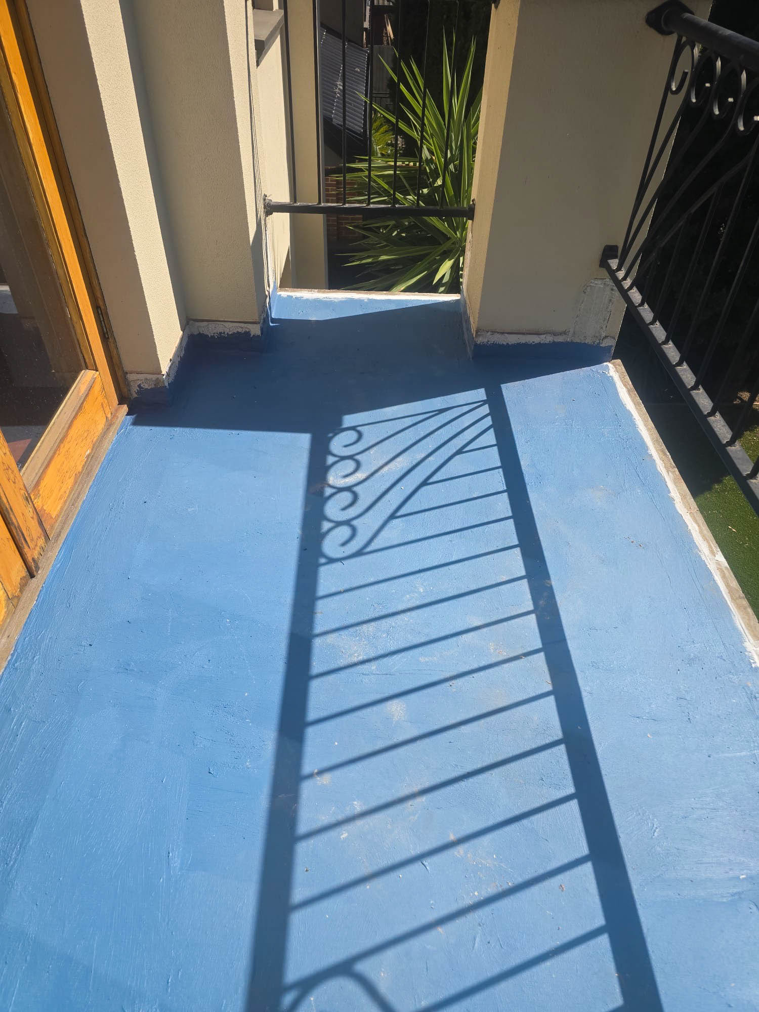 Waterproofing membrane completed across the repaired Hampton balcony