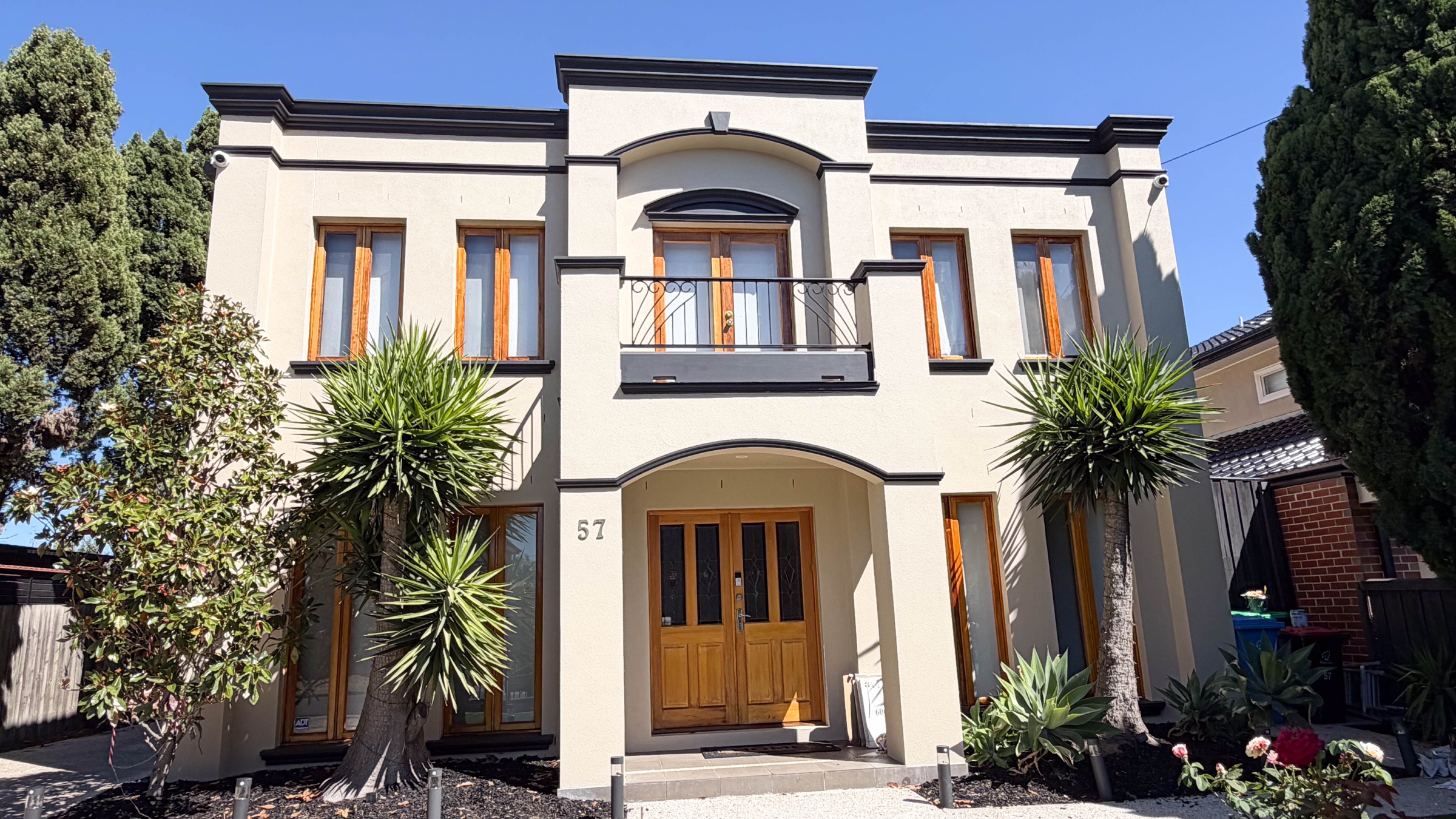 Completed Hampton exterior after façade painting, timber door and window refreshing, caulking and roof flashing repairs