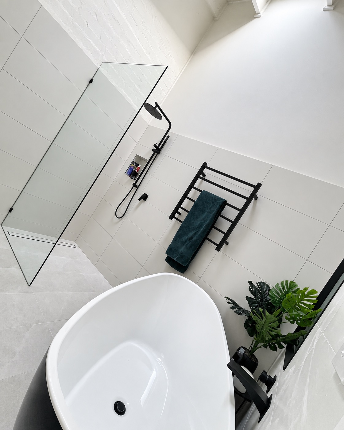 Bright completed Frankston bathroom with freestanding bath, walk-in shower and matte-black fittings