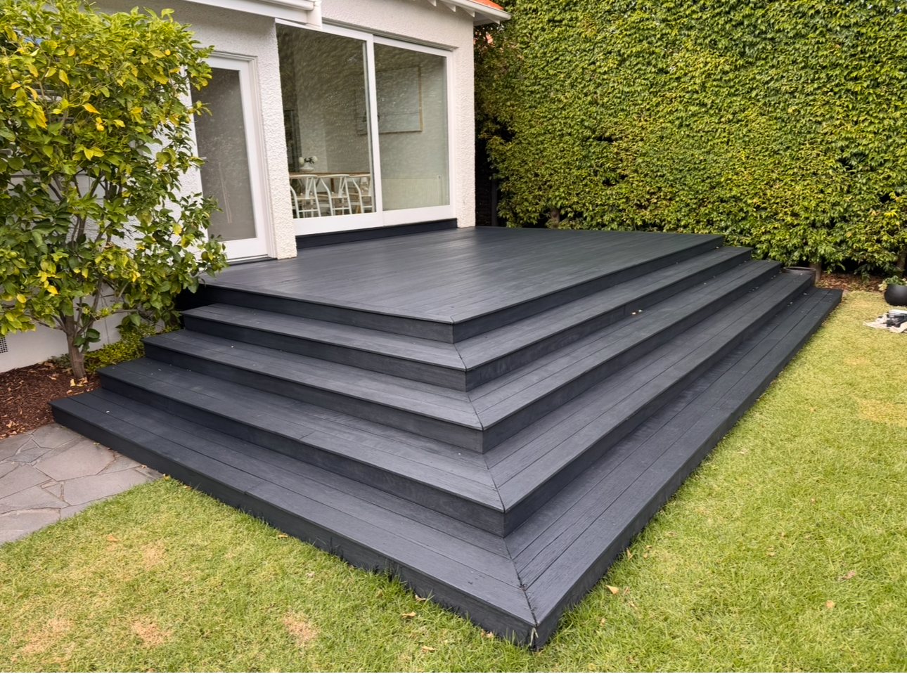 Completed Merbau deck and broad garden steps after restoration