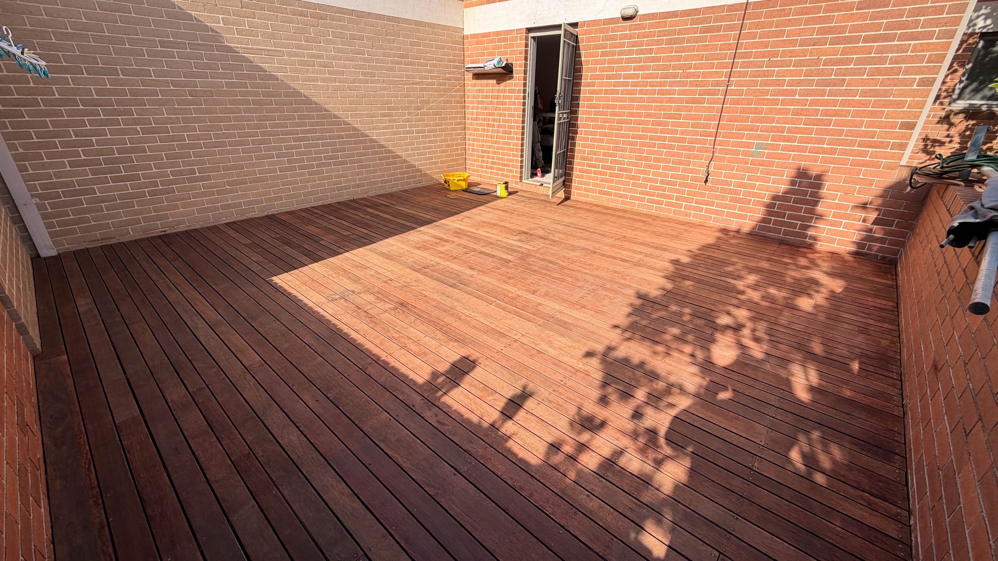 Restored timber deck with a renewed, even finish — McKinnon