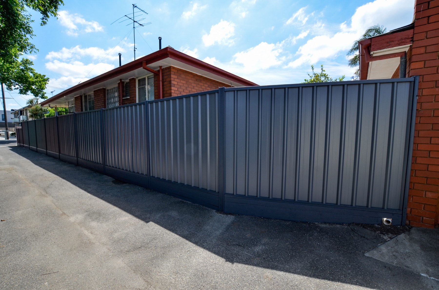 Completed Colorbond boundary fence along the side of the property