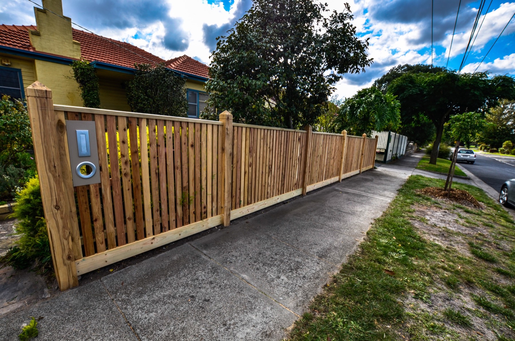 Completed timber picket fence and integrated mailbox — Bayside