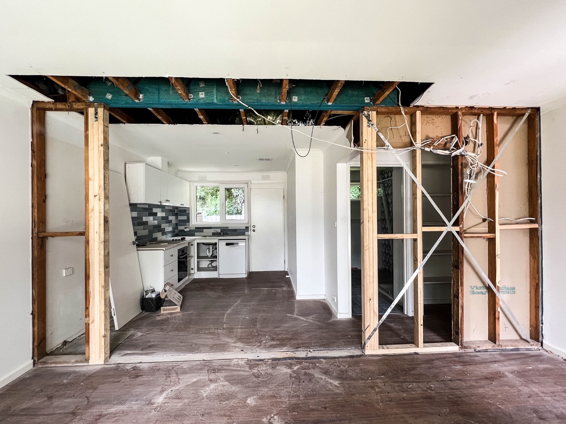 New engineered beam installed across the widened living-area opening
