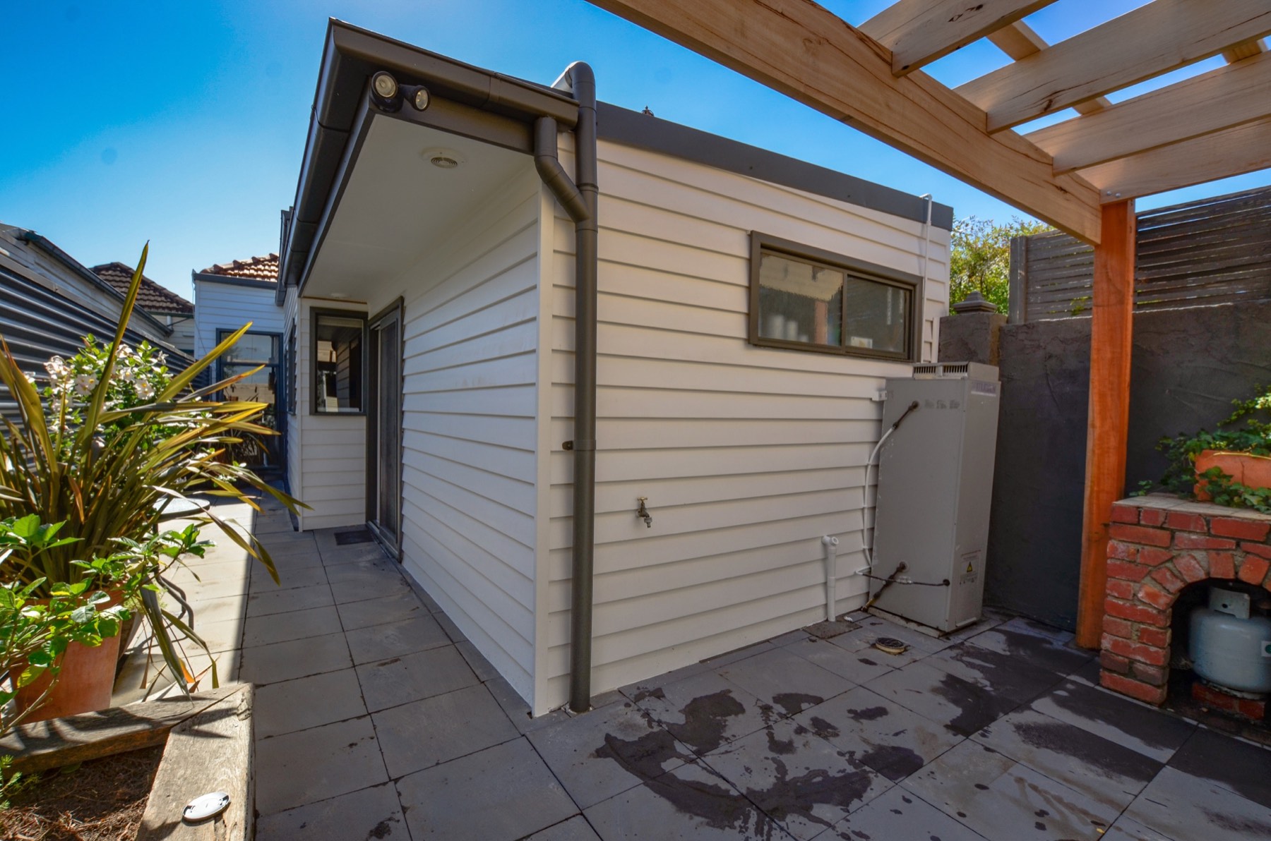 Completed whole-house weatherboard replacement with a clean, consistent exterior finish