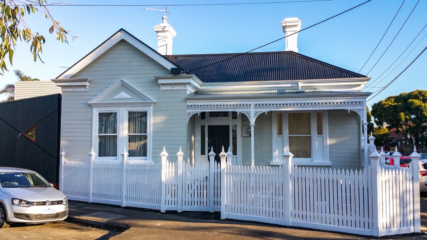 Finished front elevation with restored period details and freshly painted roof